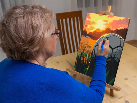 Paint by number - Fodbold ved solnedgang